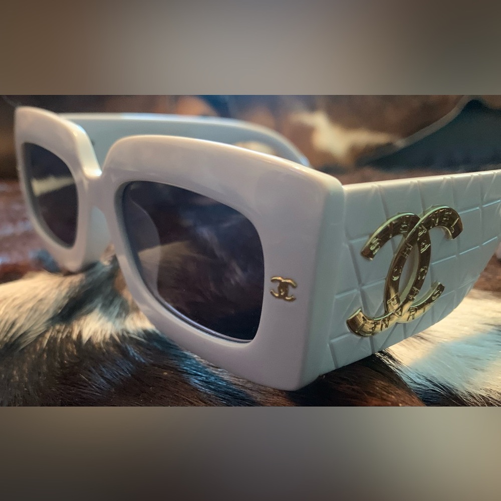 Copy. Used like new Chanel sunglasses. No Scratches. No case.